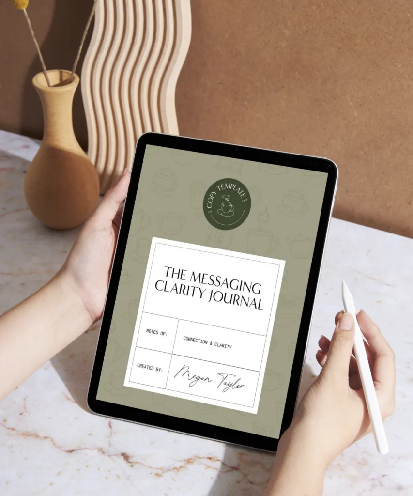 the messaging clarity journal by megan taylor shown on a tablet being held