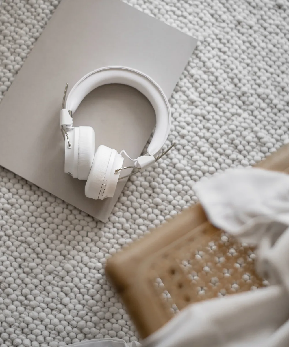 Flat lay of planner and pen — conducting market research for website copywriting