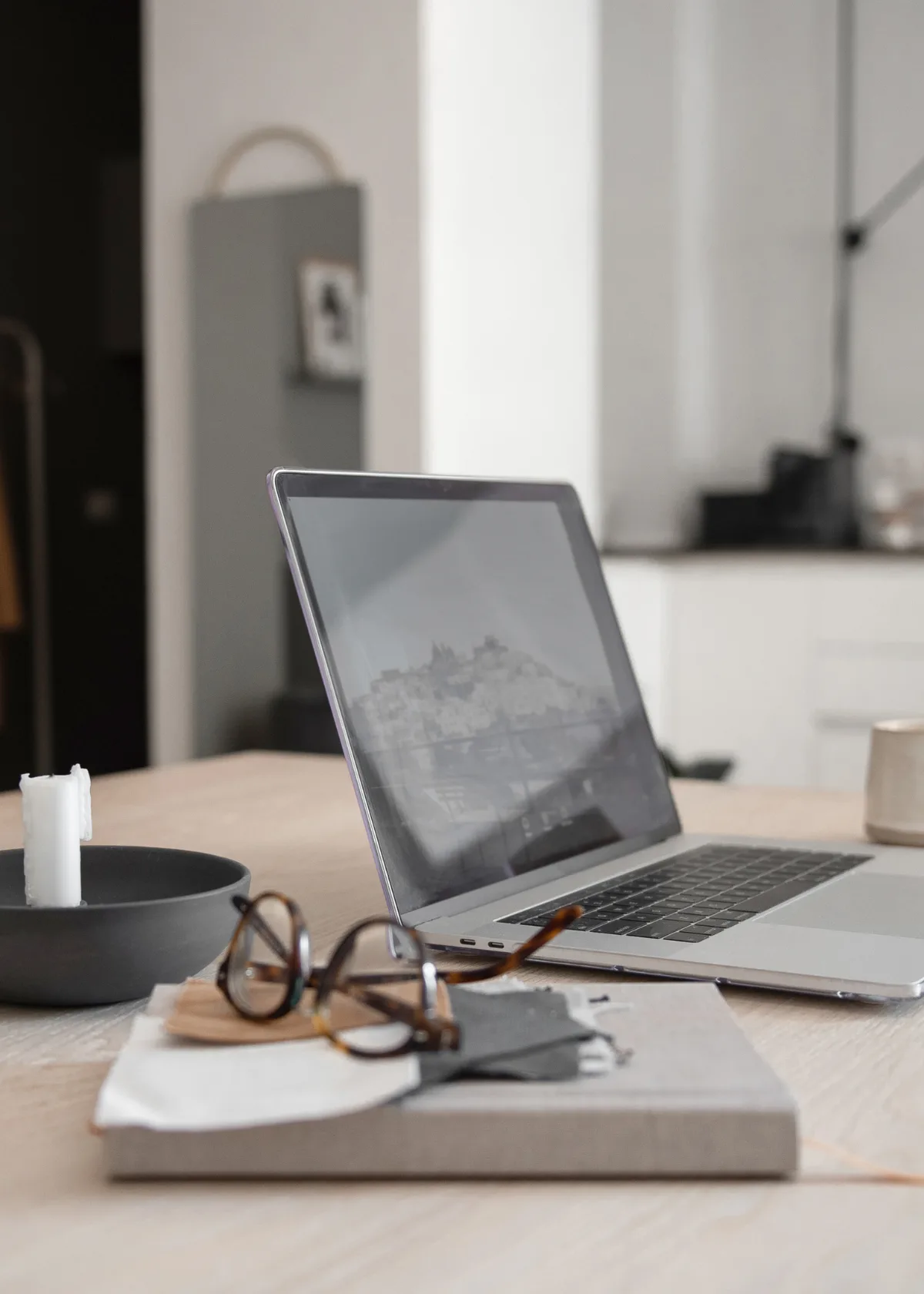 Service provider working at a minimal desk — Strongly Brewed Websites website copywriting course