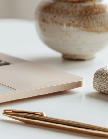 iPad and pink mug on a marble desk — what is a sales page and how to write one that converts