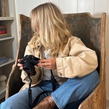 Online service provider with a camera in her cozy, on-brand studio — building a personal brand and brand voice that's hers