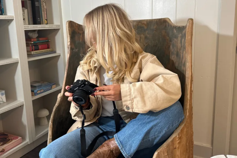 Online service provider with a camera in her cozy, on-brand studio — building a personal brand and brand voice that's hers